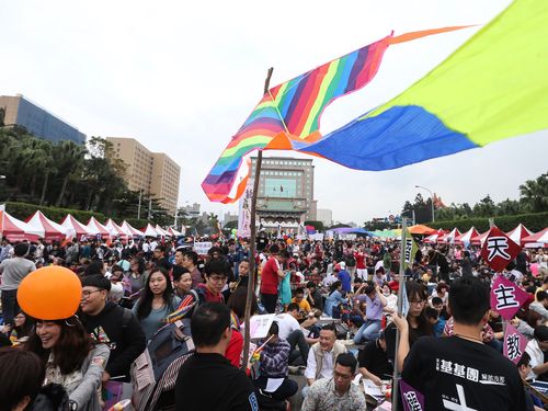 Some 200,000 people flock to a concert Saturday in downtown Taipei in support of legislation to legalize same-sex marriage.