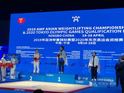 Taiwanese weightlifter Kuo Hsing-chun (郭婞淳, center) / Photo courtesy of Lin Ching-neng (林敬能)