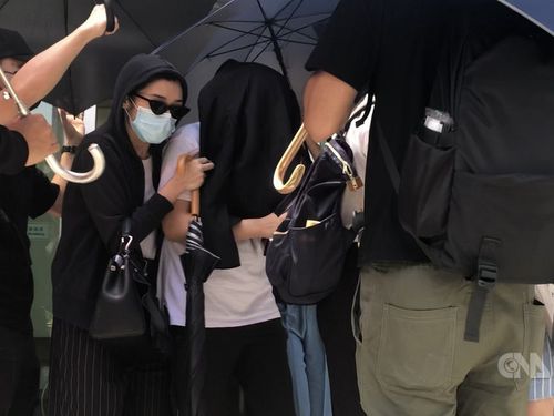 Lee Sin Ying (center) Photo courtesy of Hong Kong China News Agency
