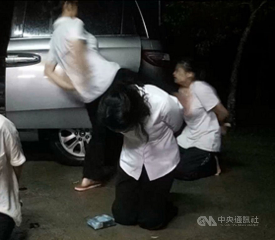 A follower gets kicked in the chest by another member of the religious cult in this undated photo (Photo courtesy of Taichung prosecutors)