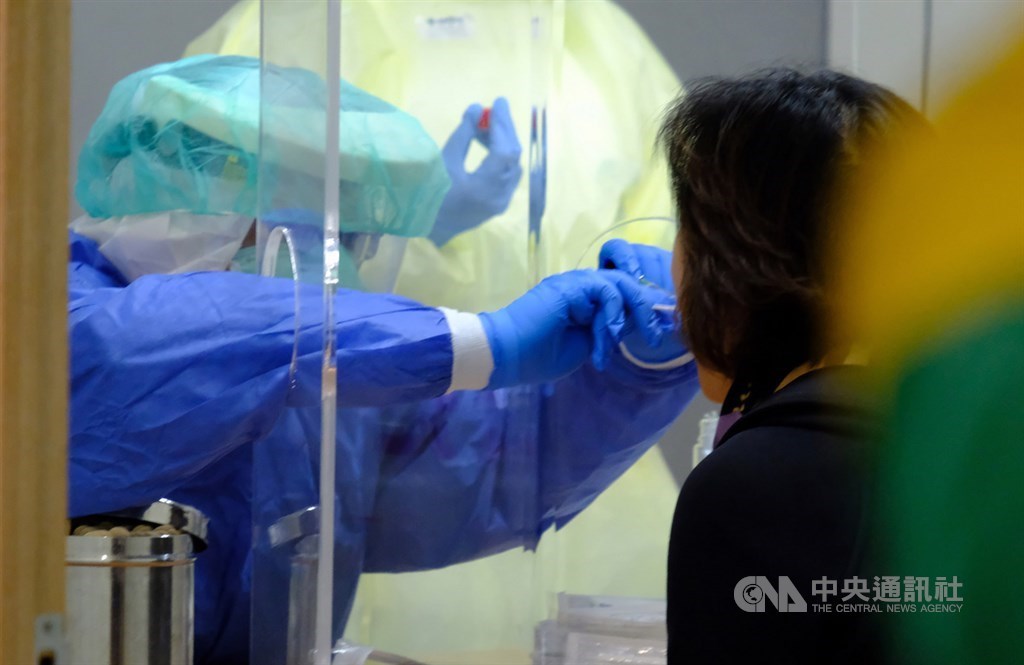 Swab test is performed at Taiwan Taoyuan International Airport