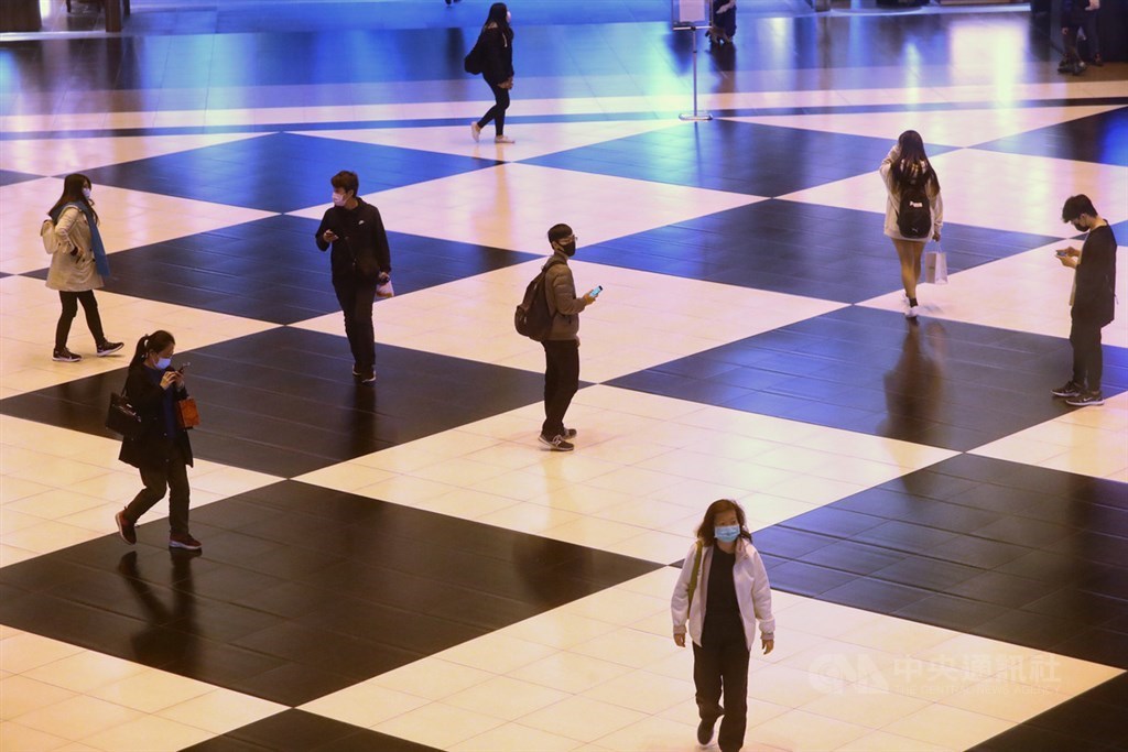 People follow social distancing protocol in Taipei