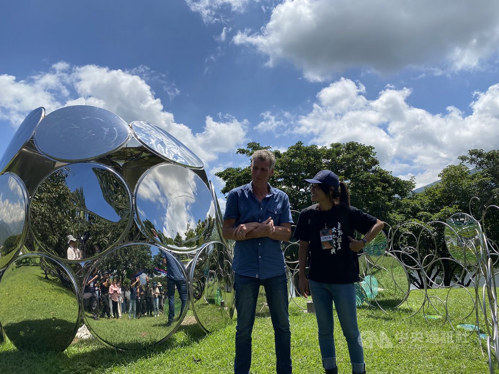 British artist Martyn Barratt (left) and his work inspired by traffic mirrors.