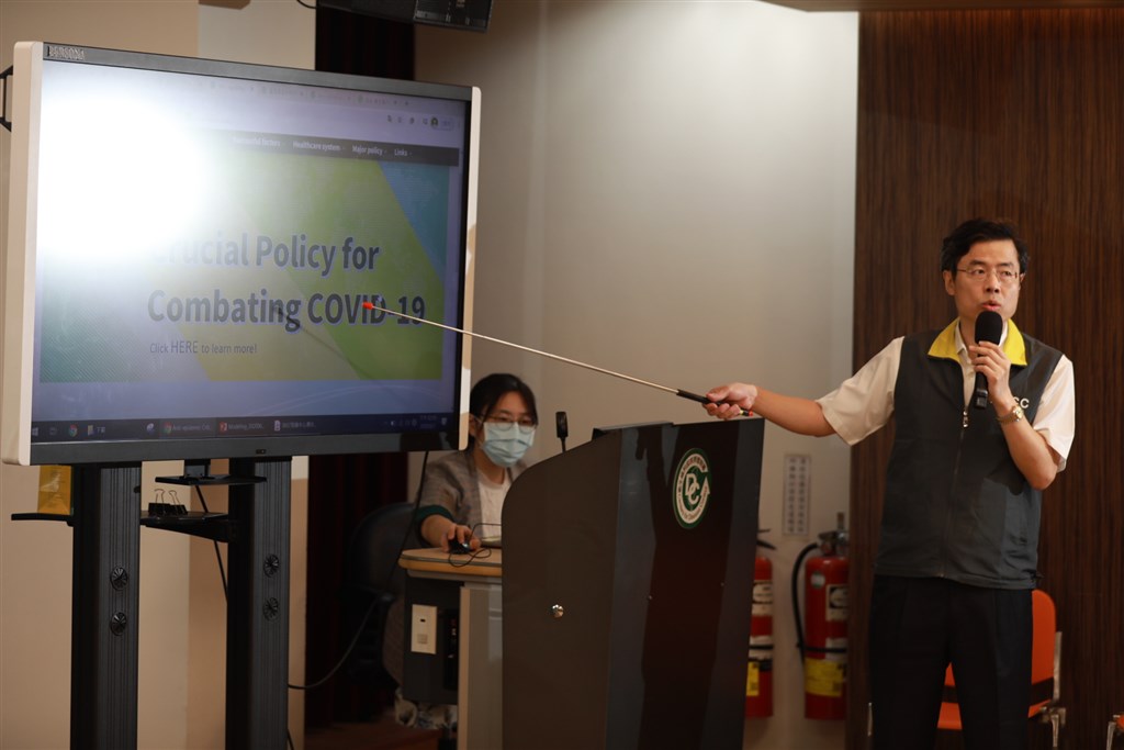 A CECC official introduces the new website during Sunday