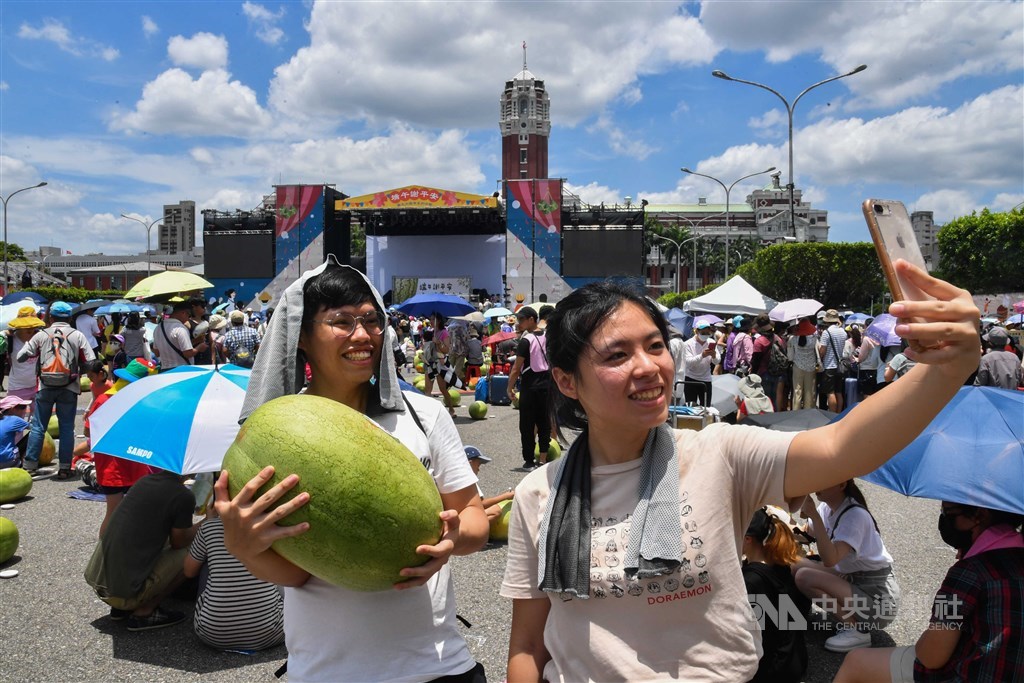 During the watermelon balancing event in front of the Presidential Office. / CNA photo June 25, 2020