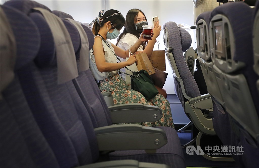 Participants onboard the aircraft. / CNA photo July 2, 2020