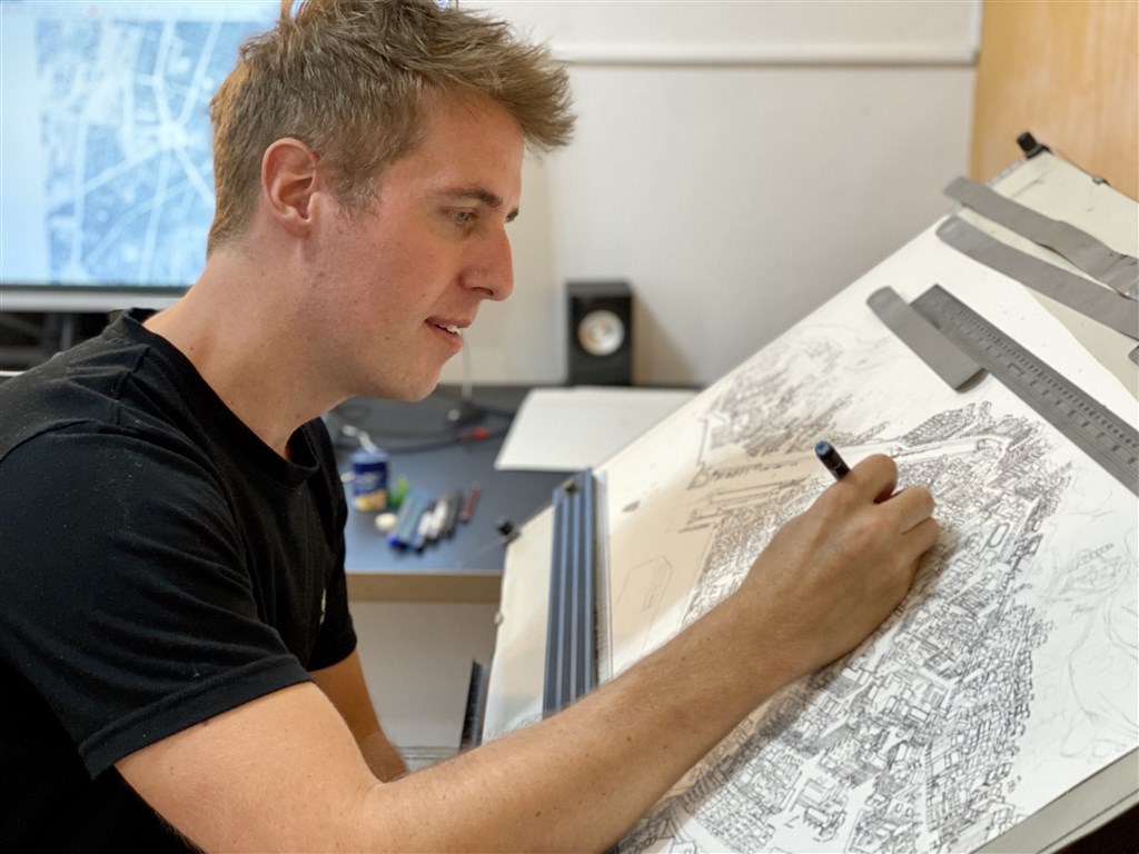 British artist Tom Rook working on his map of Hamasen, a historic area of Kaohsiung
