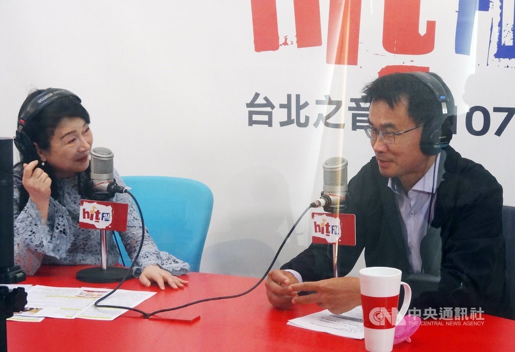 Agriculture Minister Chen Chi-chung (right) is interviewed in a morning radio show Tuesday. CNA photo July 14, 2020