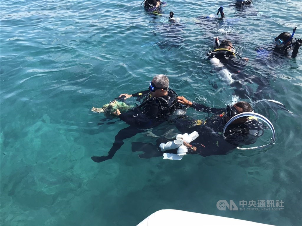 Divers taking part in an ocean cleanup activity in Taiwan