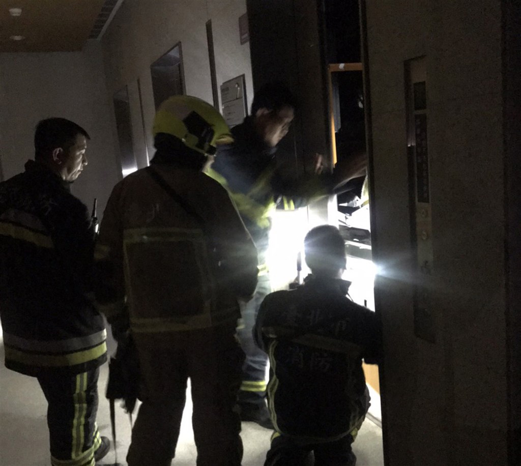 Firefighters rescuing those stuck in the elevators.