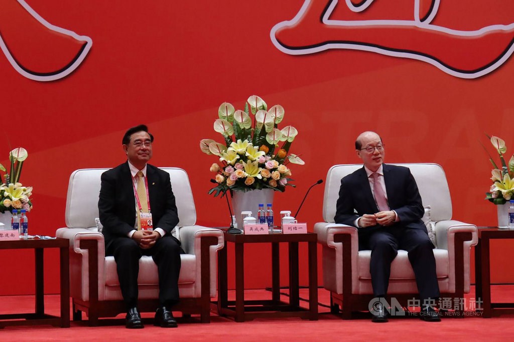 Liu Jieyi (right), the director of China