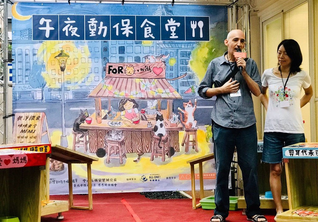 Italian Stefano Misesti and his wife Beni Chu talk about their reasons for helping with the installation of the city