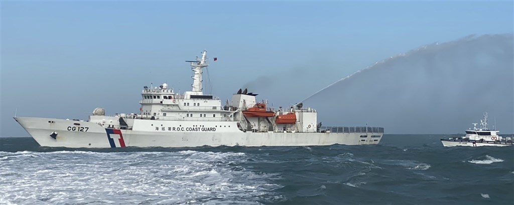 A Coast Guard vessel uses water canon to disperse Chinese ships. Photo courtesy of the Coast Guard Administration