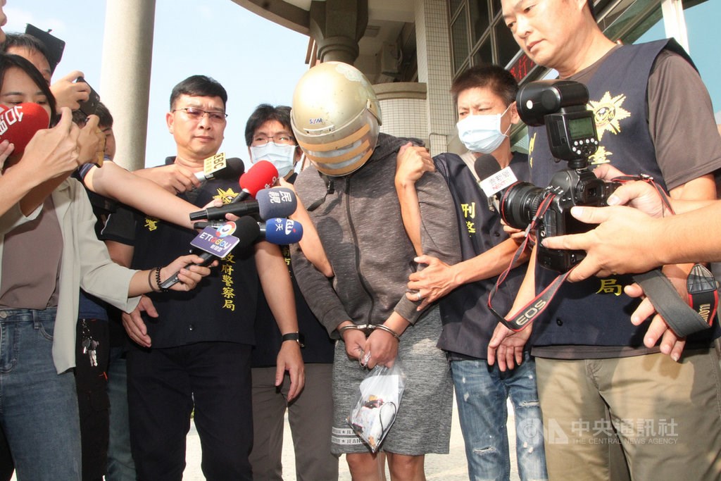 The suspect (in helmet). CNA photo Oct. 30, 2020