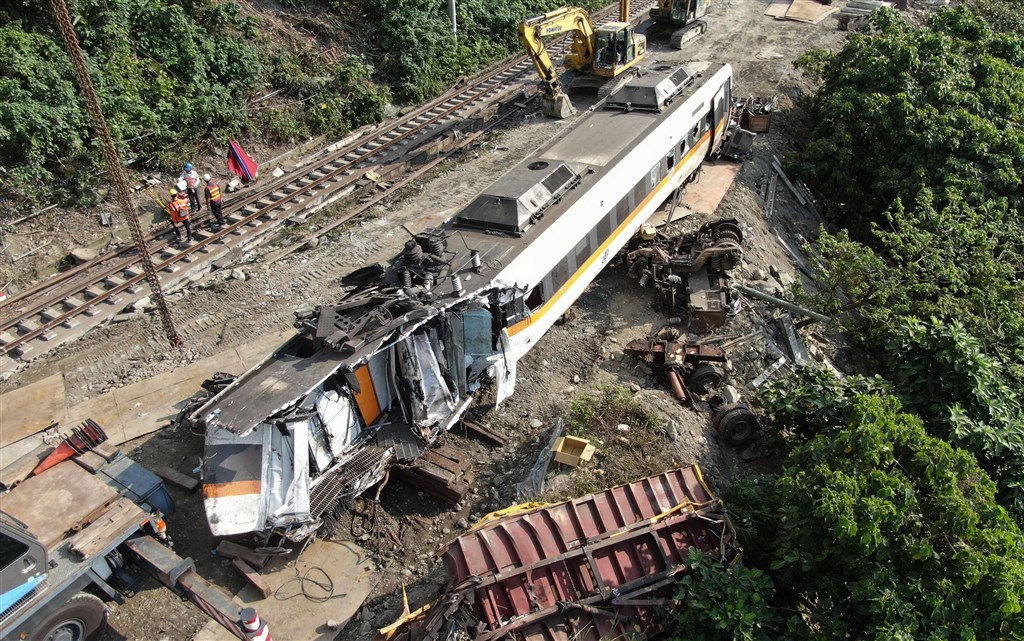 The third carriage is placed by the track after it was moved out of the Qingshui Tunnel on Tuesday. CNA photo April 6, 2021