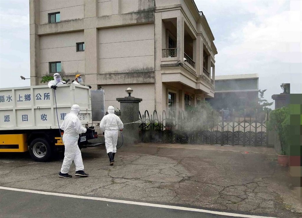 Chiayi County government workers disinfect the factory, where a cluster of COVID-19 infections were identified. Photo courtesy of Chiayi County government