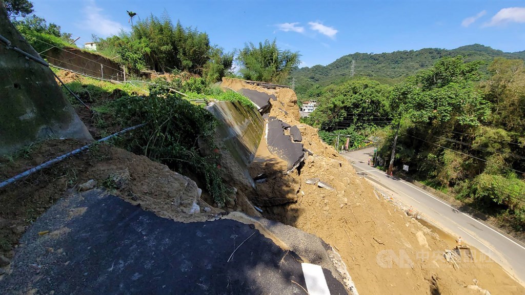 Debris of a mudslide block a road in Miaoli County, where a tropical depression made landfall on Sunday, bringing heavy rainfall that caused floods and mudslides in central and southern Taiwan. CNA photo Aug. 10, 2021