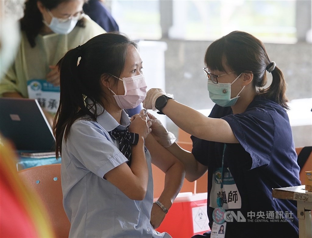 A woman receive a COVID-19 vaccine in a Carrefour store in Kaohsiung in late November. CNA file photo