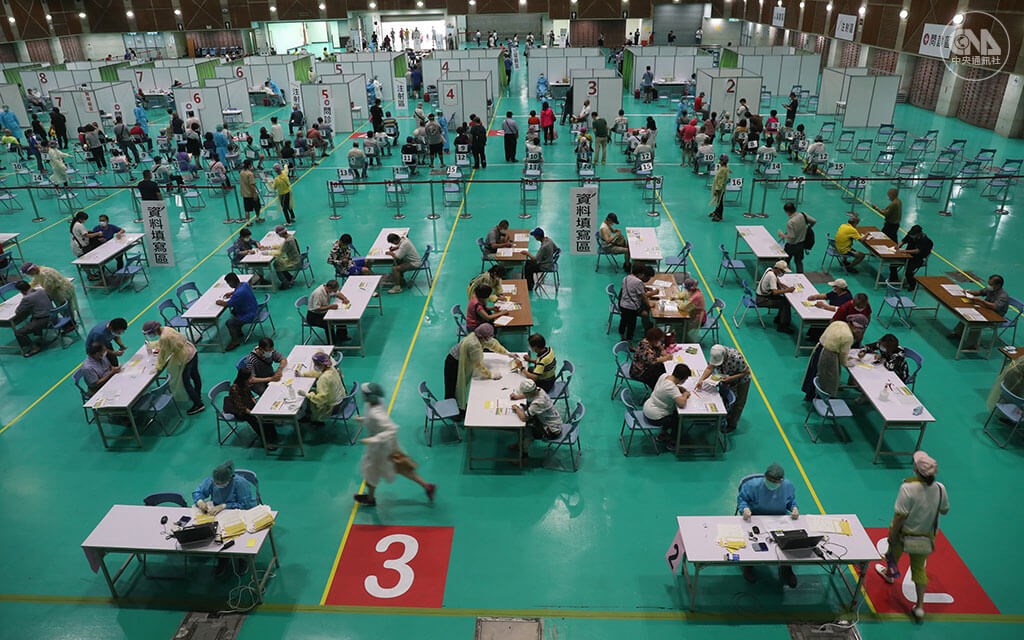 People get vaccinated against COVID-19 at a vaccination site set up in the New Taipei City Exhibition Hall on July 12.
