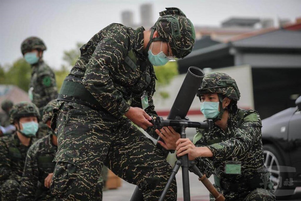 Reservists take part in the latest round of training under a new tougher regime on Monday. Photo: Military News Agency