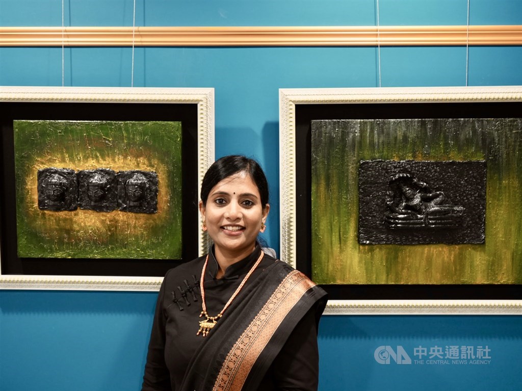 Vandana Mengane poses next to 