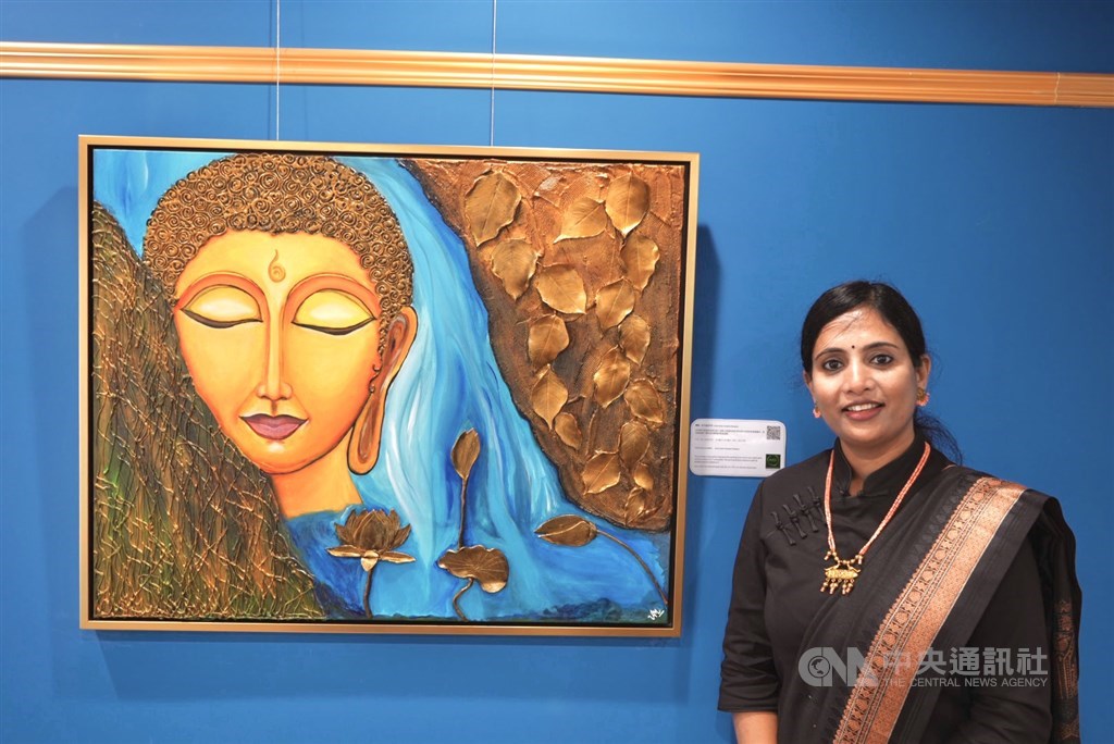 Vandana Mengane poses next to 