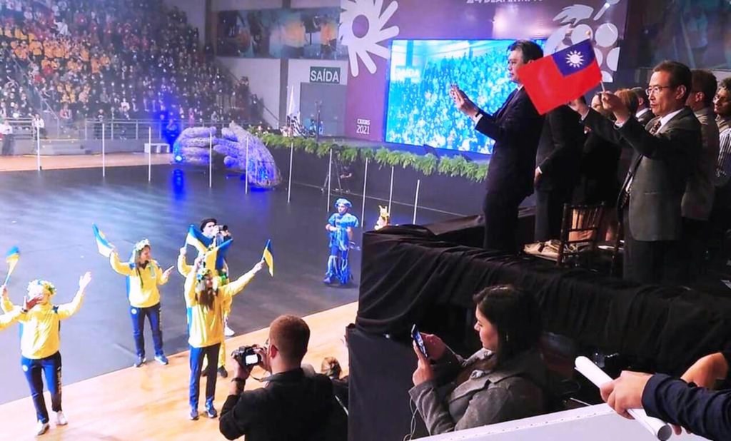 Fong Kuang-jong, head of the Taipei Economic and Cultural Office in São Paulo, waves the Republic of China flag when attending the opening of the Deaflympic Games in Caxias do Sul, Brazil. Photo courtesy of the office