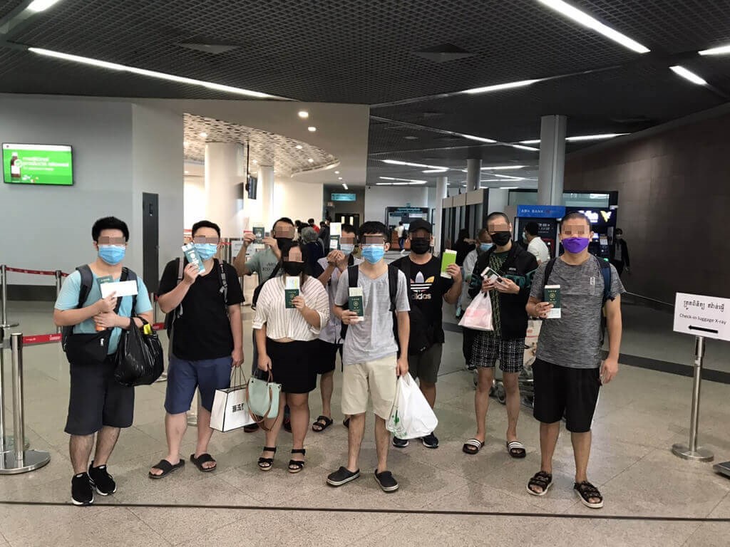 Nine of the 11 victims are pictured at Phnom Penh Airport before taking a flight back to Taiwan on Monday. Photo courtesy of Taiwan