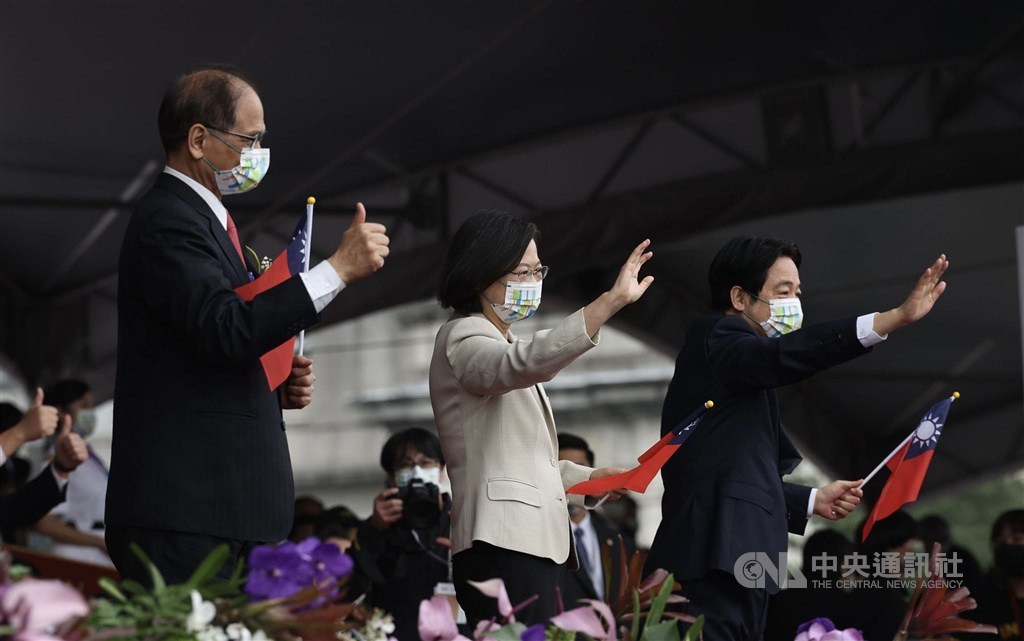 From left: Legislative Speaker You Si-kun, President Tsai Ing-wen and Vice President Lai Ching-te wave to the participants of the National Day parade in Taipei on Monday. CNA photo Oct. 10, 2022