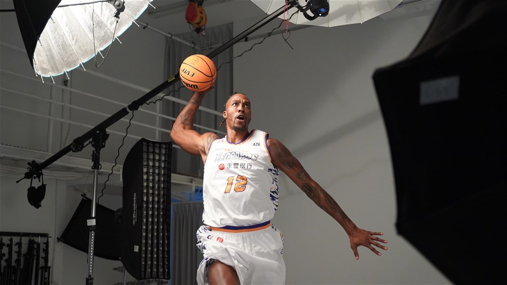 Former NBA player Dwight Howard poses for a photo shoot ahead of his debut in Taiwan