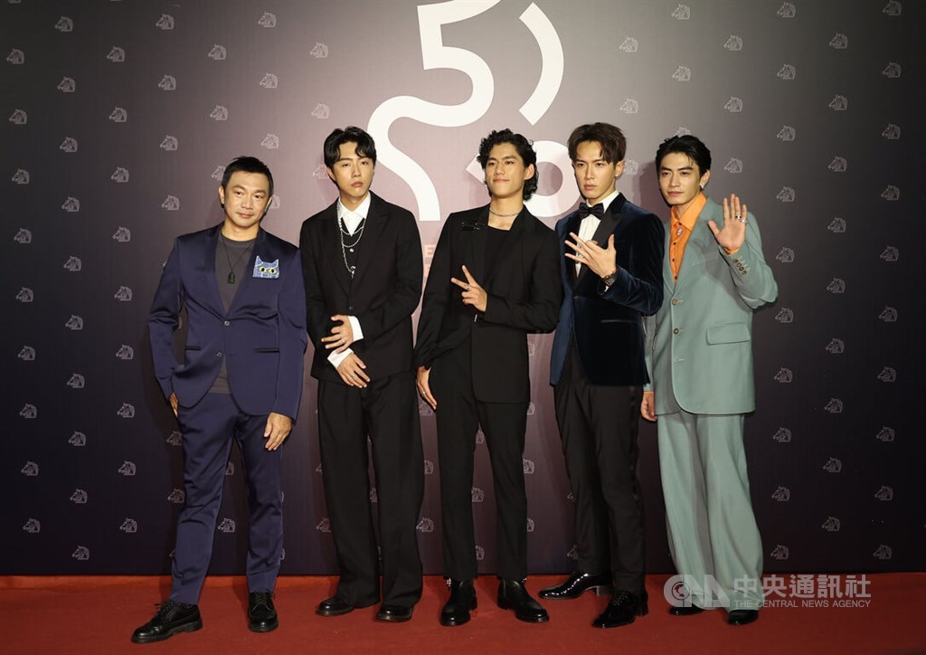Actor-turned-director Ka Ko (second right) and members of the production team of his directorial but "Bad Education," which earned four nominations, including one fore best new director for Ko, arrive at the awards ceremony in Taipei on Saturday. CNA photo Nov. 19, 2022