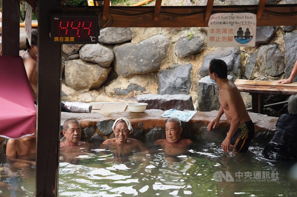 People enjoy a hot spring in Taipei