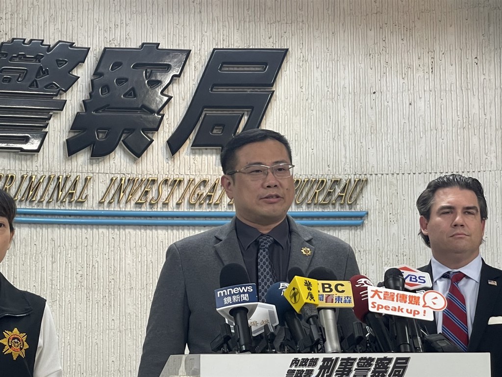 CIB official in charge of international affairs, Dustin Lee (center) speaks at a news conference in Taipei Friday. Photo courtesy of Criminal Investigation Bureau