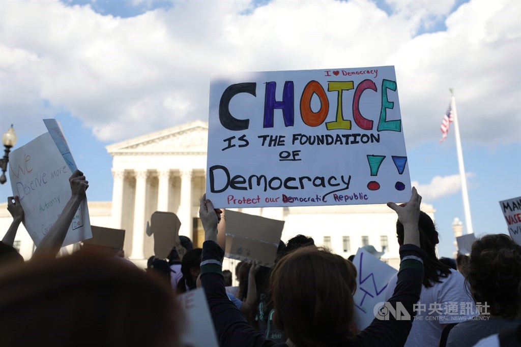 Protesters supporting a women