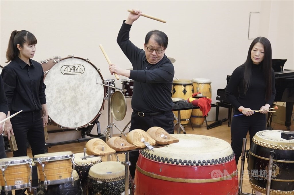 Ju Tzong-ching (center) performs two minutes of the music from Cloud Gate Dace Theater's "Legacy" in Taipei on Tuesday. CNA photo Jan. 3, 2023.