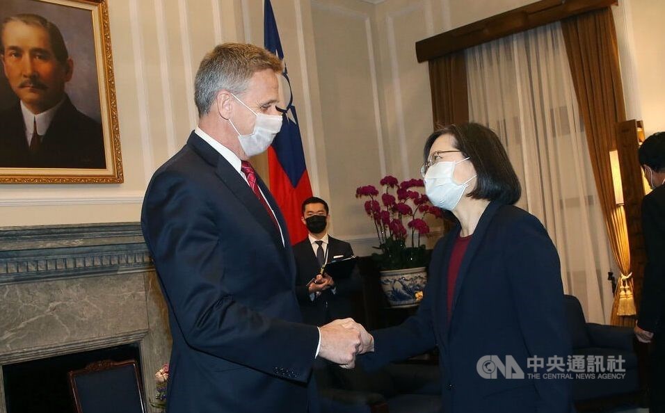Retired United States Admiral Philip Davidson (left) shakes hands with President Tsai Ing-wen at the Presidential Office in Taipei Thursday. CNA photo Feb. 2, 2023