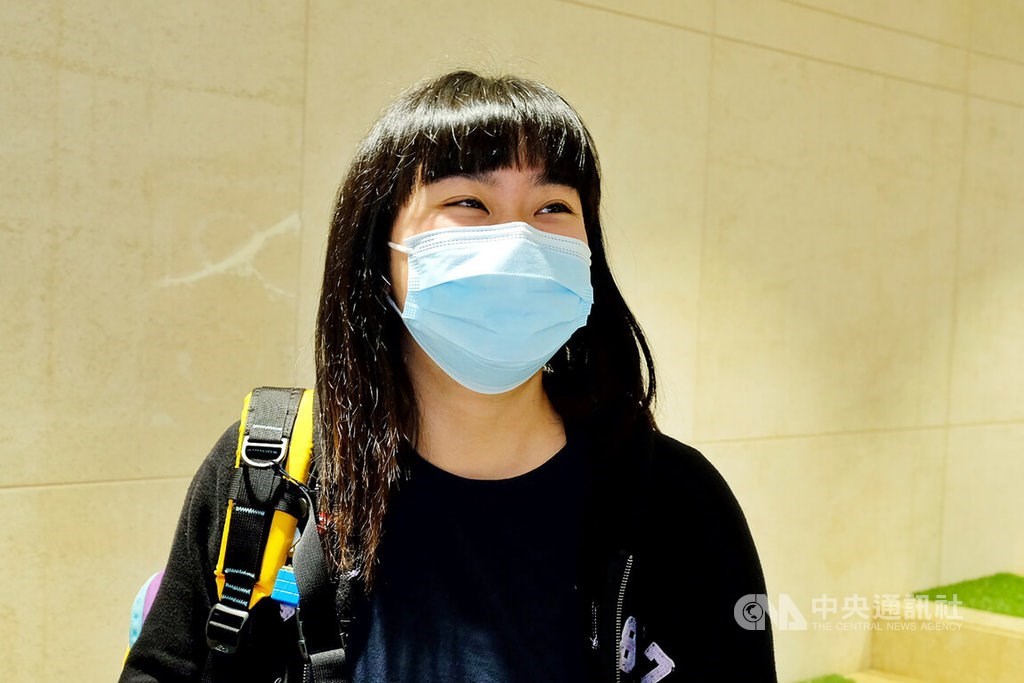 A woman passenger, surnamed Tam, says she plans to visit Taipei 101 and tour the night markets. CNA photo Feb. 20, 2023