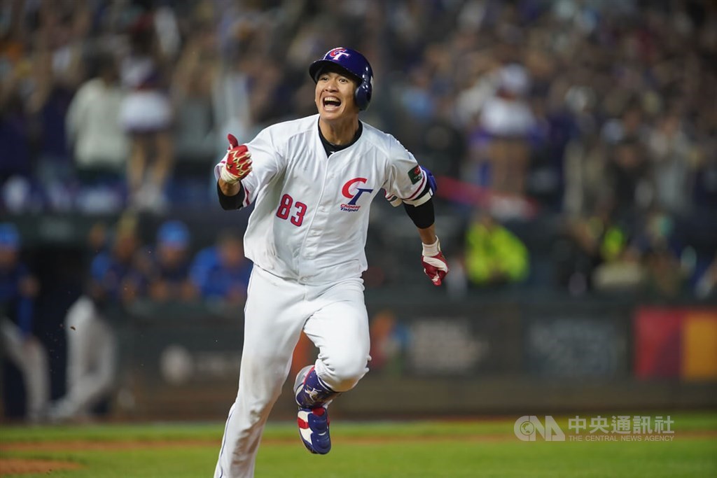Lin Li runs toward the first base after making a hit in March 10