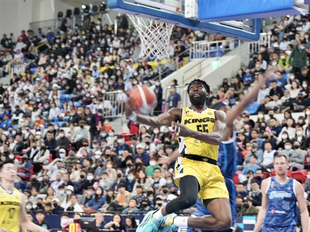 Kenny Manigault hangs in the air for a layup attempt in Saturday