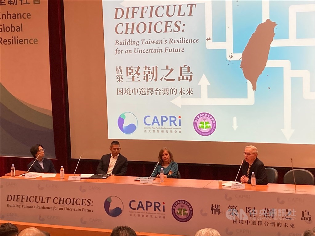 Former American Institute in Taiwan Chairman and Managing Director Richard Bush (right) speaks at the "Difficult Choices: Building Taiwan