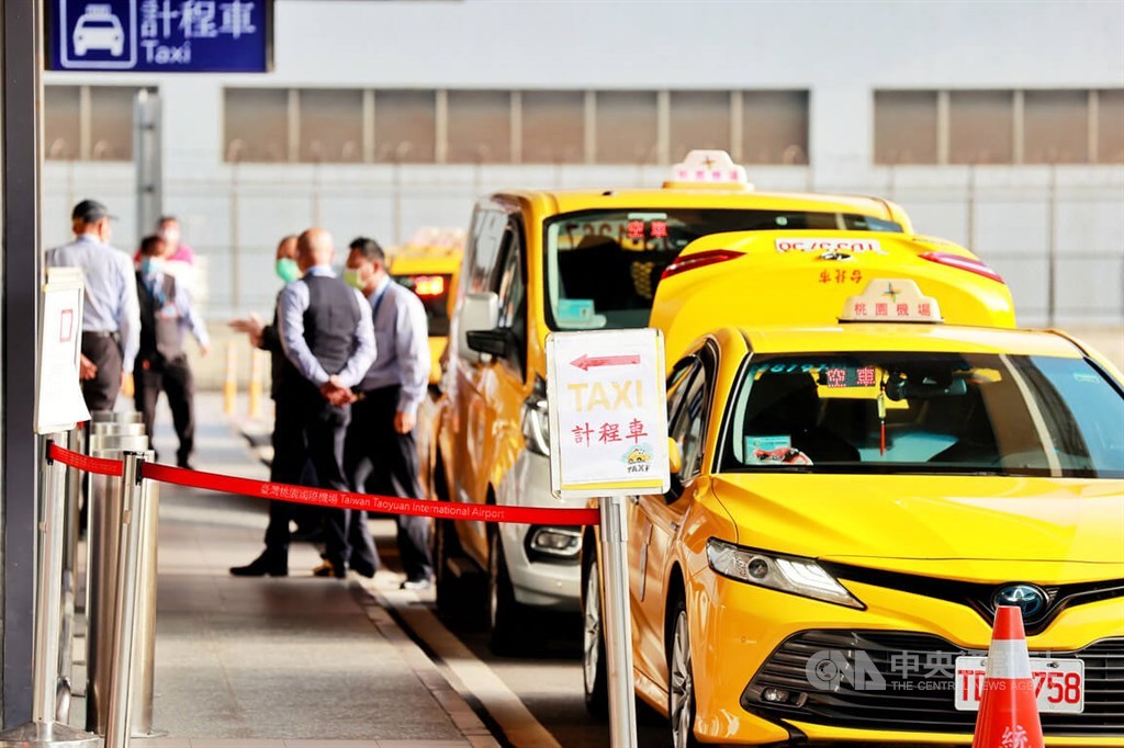 Taxis wait in line outside the Taoyua International Airport in this CNA photo taken on Jan. 19, 2023.