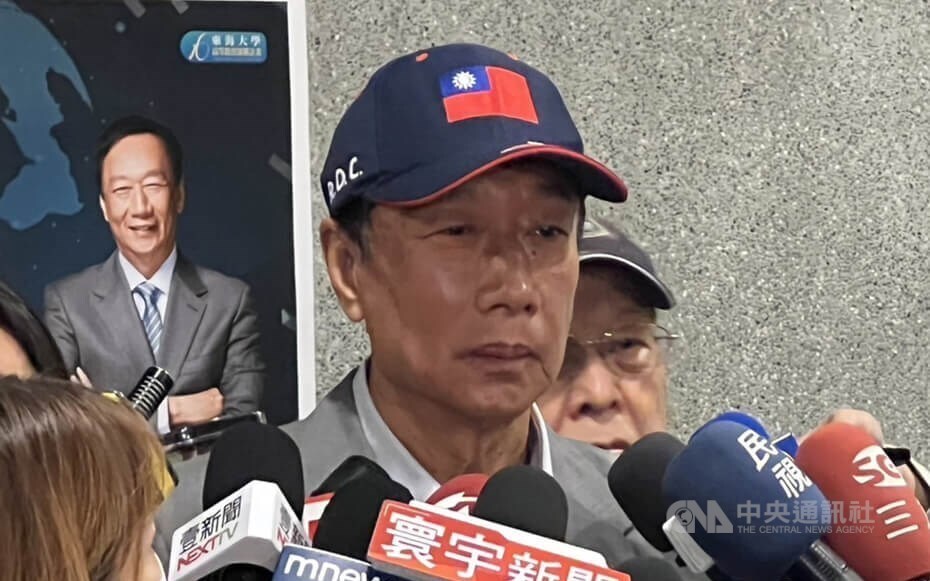 Business tycoon and Kuomintang (KMT) presidential hopeful Terry Gou speaking with local press after his appearence Thursday. CNA photo April 27, 2023