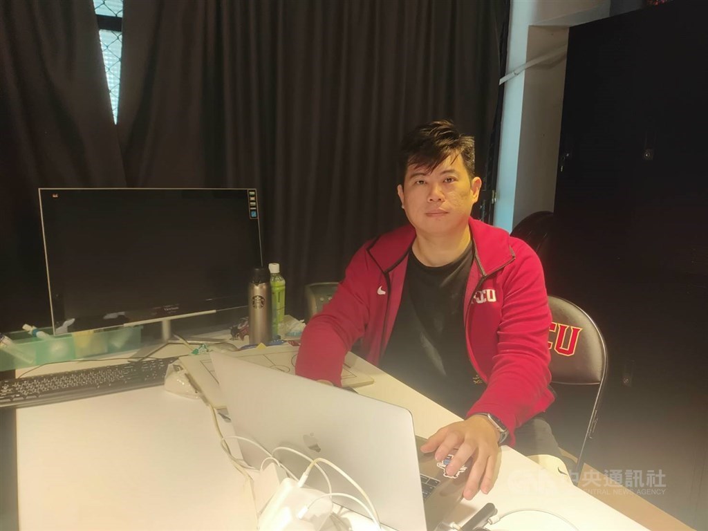 Coach Riley Yang (楊致寬) sits in an office at Fu Jen Catholic University on May 10. CNA photo May 19, 2023
