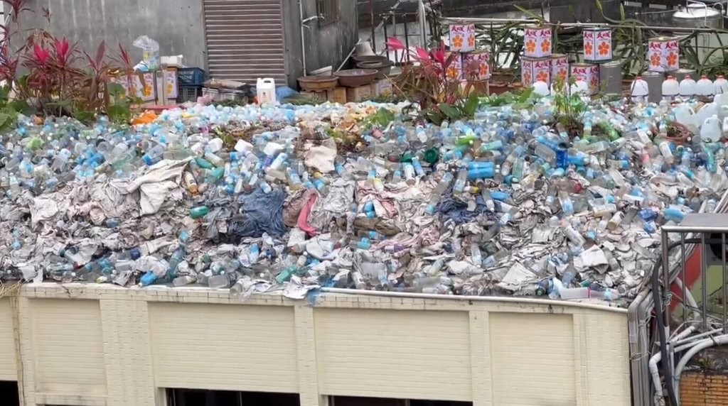 Yilan hotel ordered to clean up 'mountain' of plastic bottles on roof