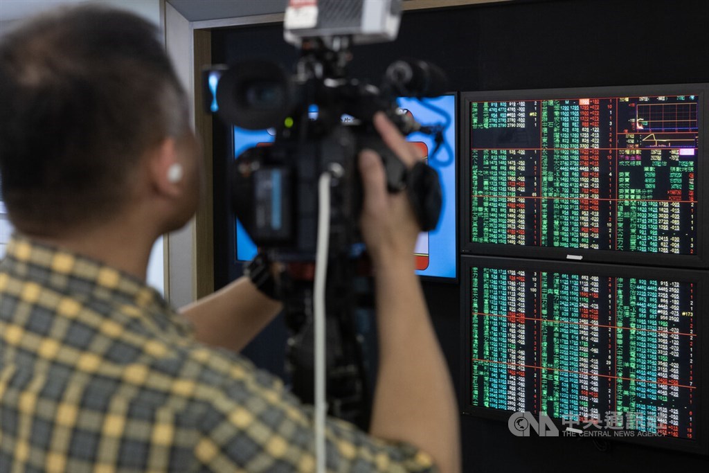 Taiwan shares open lower