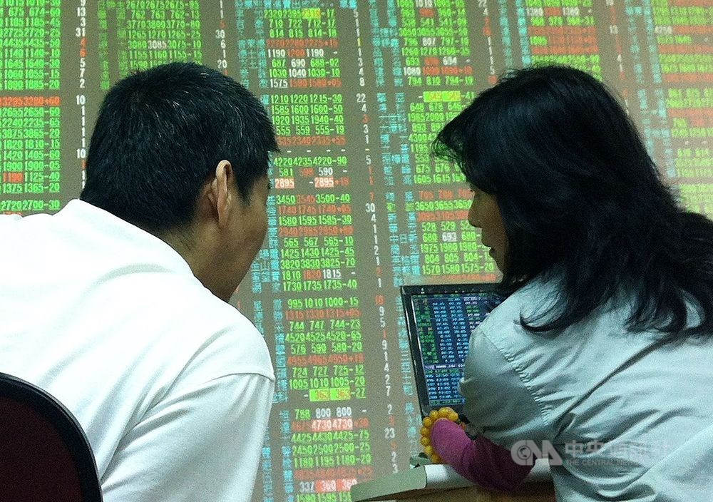 Taiwan shares open lower