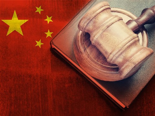 Father and son found guilty of spying for China