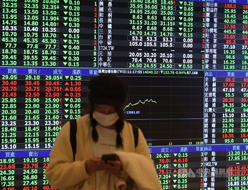 Taiwan shares open lower