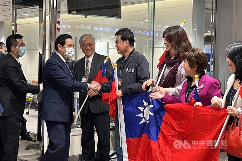 Former President Ma Ying-jeou (second left) is greeted by KMT officials and lawmakers at Taiwan Taoyuan International Airport Friday. CNA photo April 7, 2023