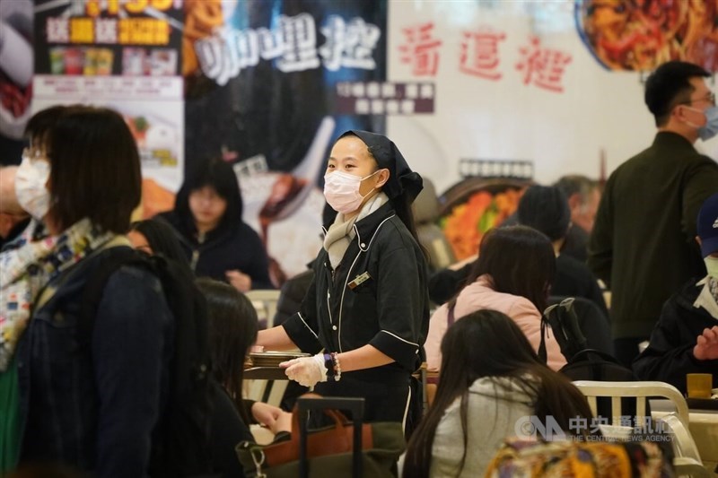 This illustration photo taken in December 2022 shows a worker at the food court in Taipei Main Station. An increase in job openings in domestic demand-oriented sectors has been said to be a factor behind the lower jobless rate in April. CNA file photo